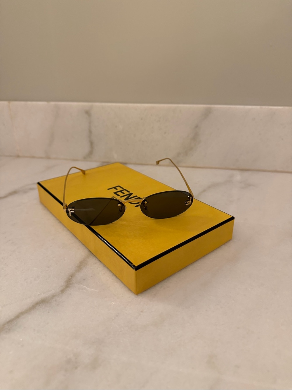 Fendi Oval Rimless Sunglasses in Gold with  Brown Lenses